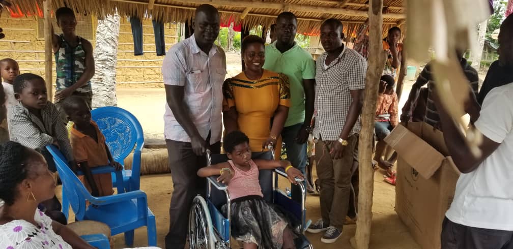Madam Dorcas Affo-Toffey Donates Wheelchair to a Disabled Child 